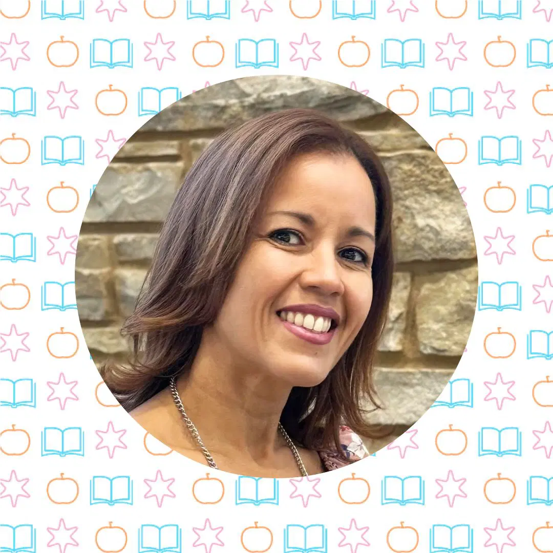Person smiling against a background of stone bricks in a circular frame, surrounded by a pattern of books, stars, and apples.