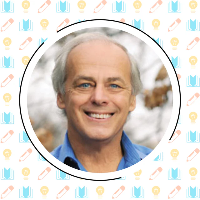Smiling middle-aged man with short grey hair, framed in a circular blue border with a background of book and pencil icons symbolizing the science of reading.
